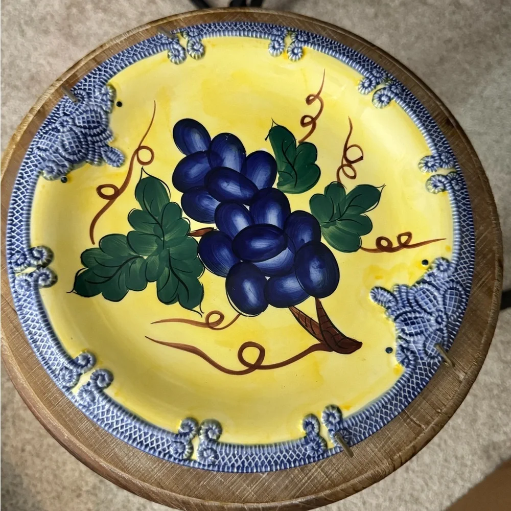 Vibrant Yellow Plate with Grapes Design